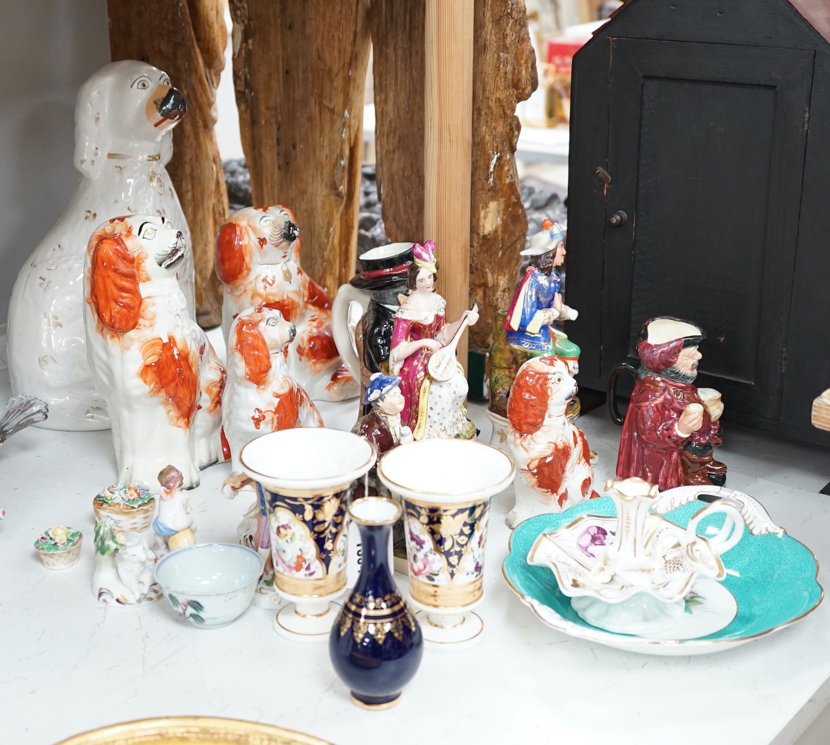 19th century and later porcelain and ceramics including Staffordshire comforter spaniels, Doulton Toby jugs, Coalport dish and Limoges enamel vase